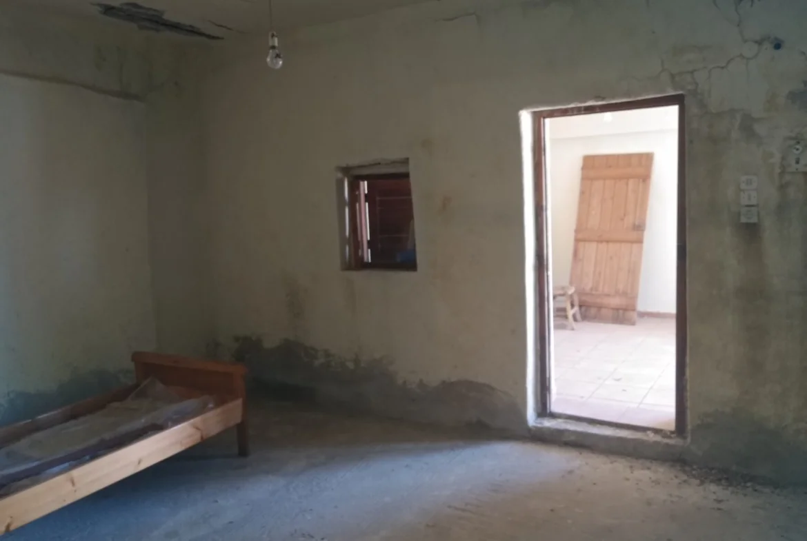 Traditional stone house with mountain views in Melambes.