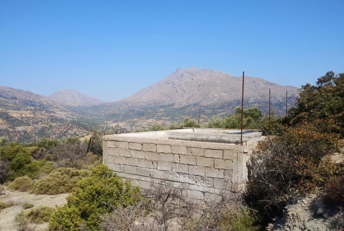 Large plot of 70.000 sq.m. with building in the area of Agia Galini