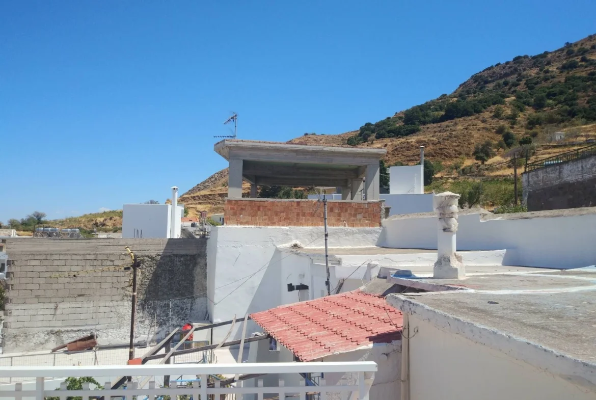 Traditional stone house with mountain views in Melambes.
