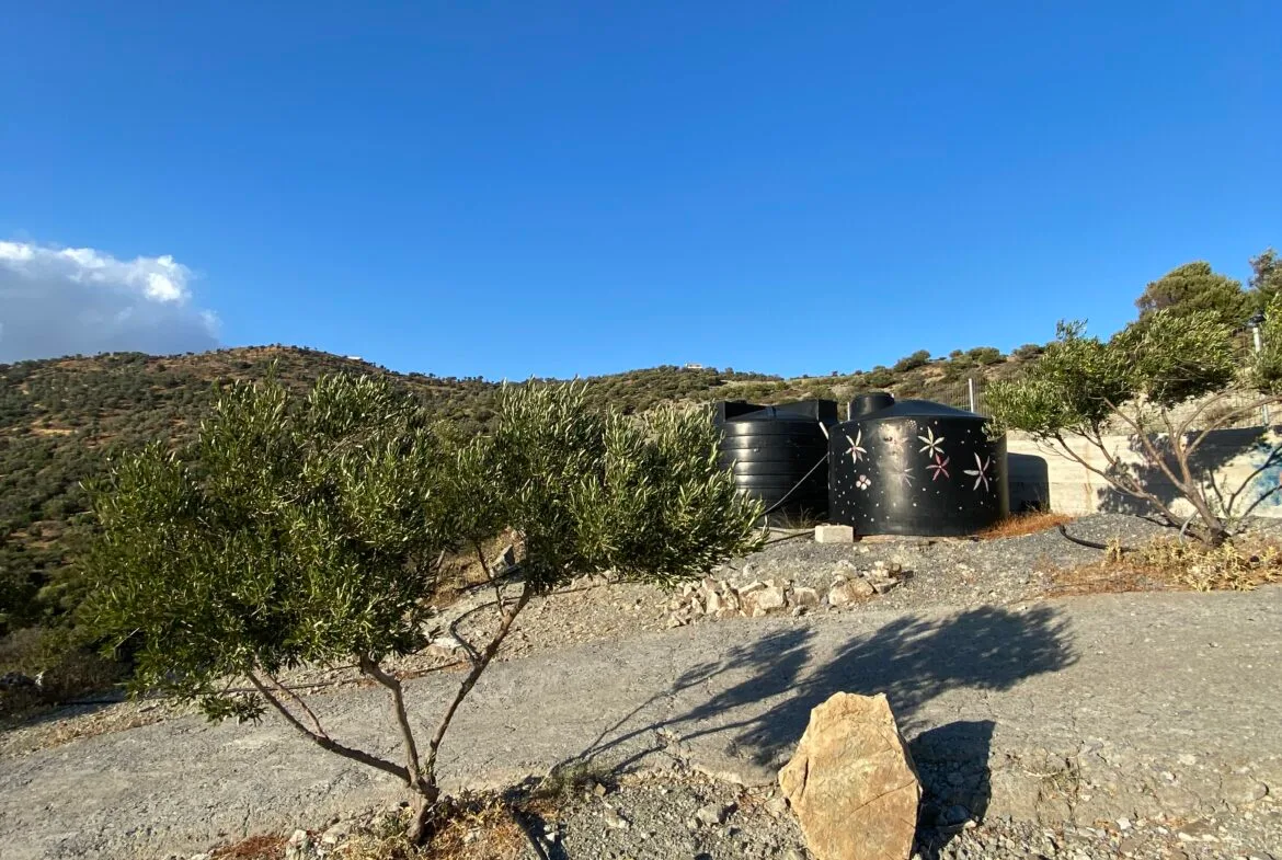 14.173 sqm plot with house for sale.