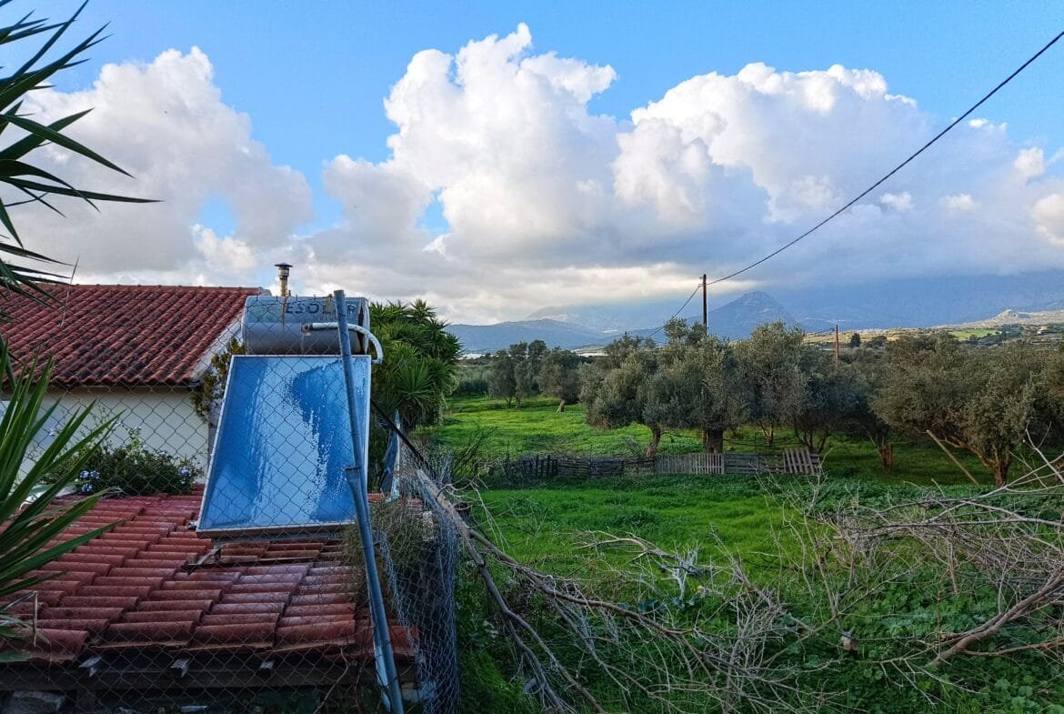 Plot in Vori village with house.