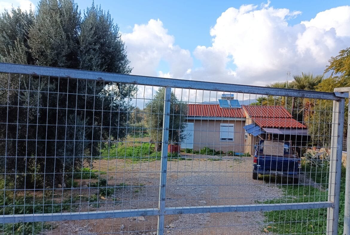 Plot in Vori village with house.