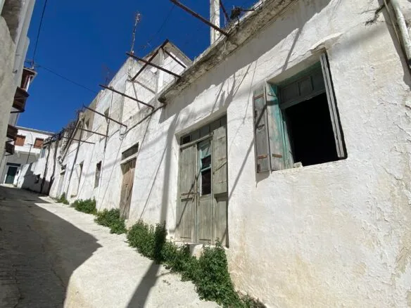 Three-storey building in Melampes.