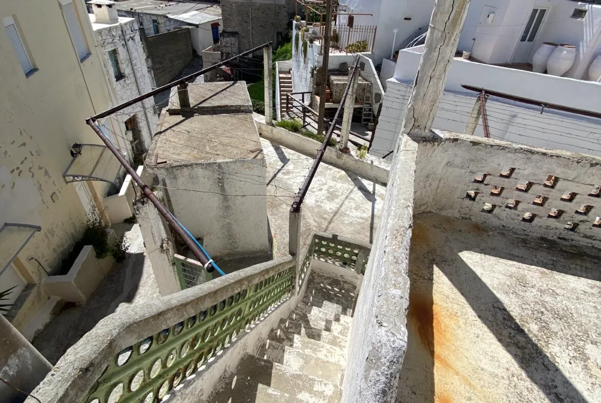 Three-storey building in Melampes.