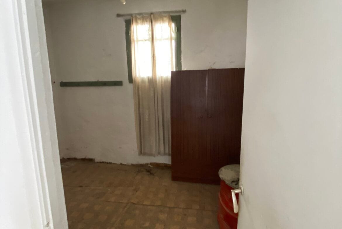 Three-storey building in Melampes.