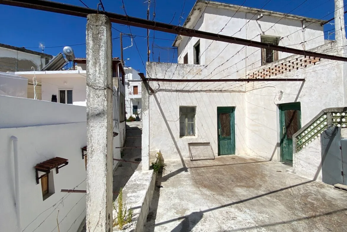 Three-storey building in Melampes.