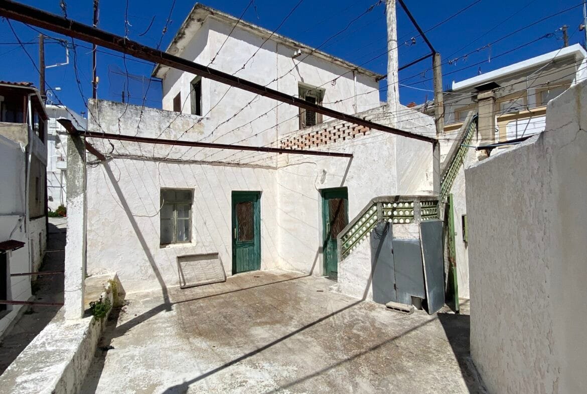 Three-storey building in Melampes.