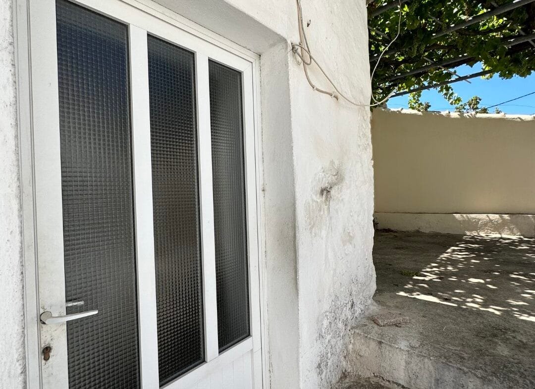 Two-storey house in the village of Vatos.