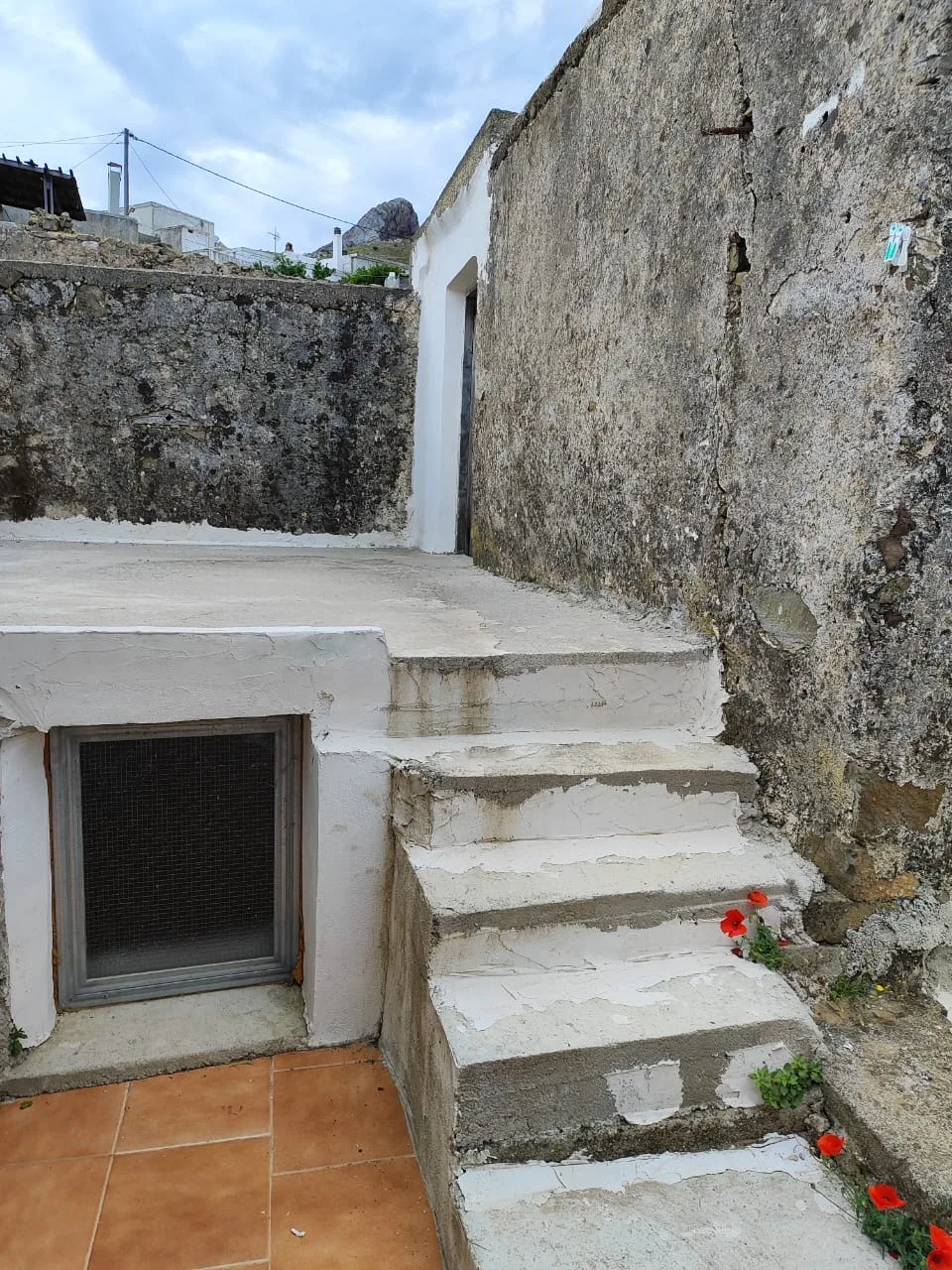 image00026 Two-story stone house in Sactouria.