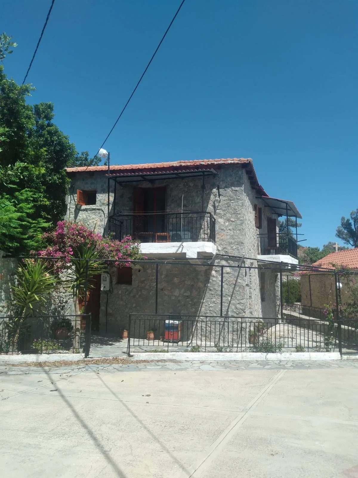 image00003 Two-story stone house for sale.